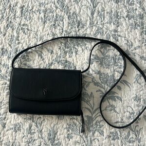 EUC black zip around crossbody clutch